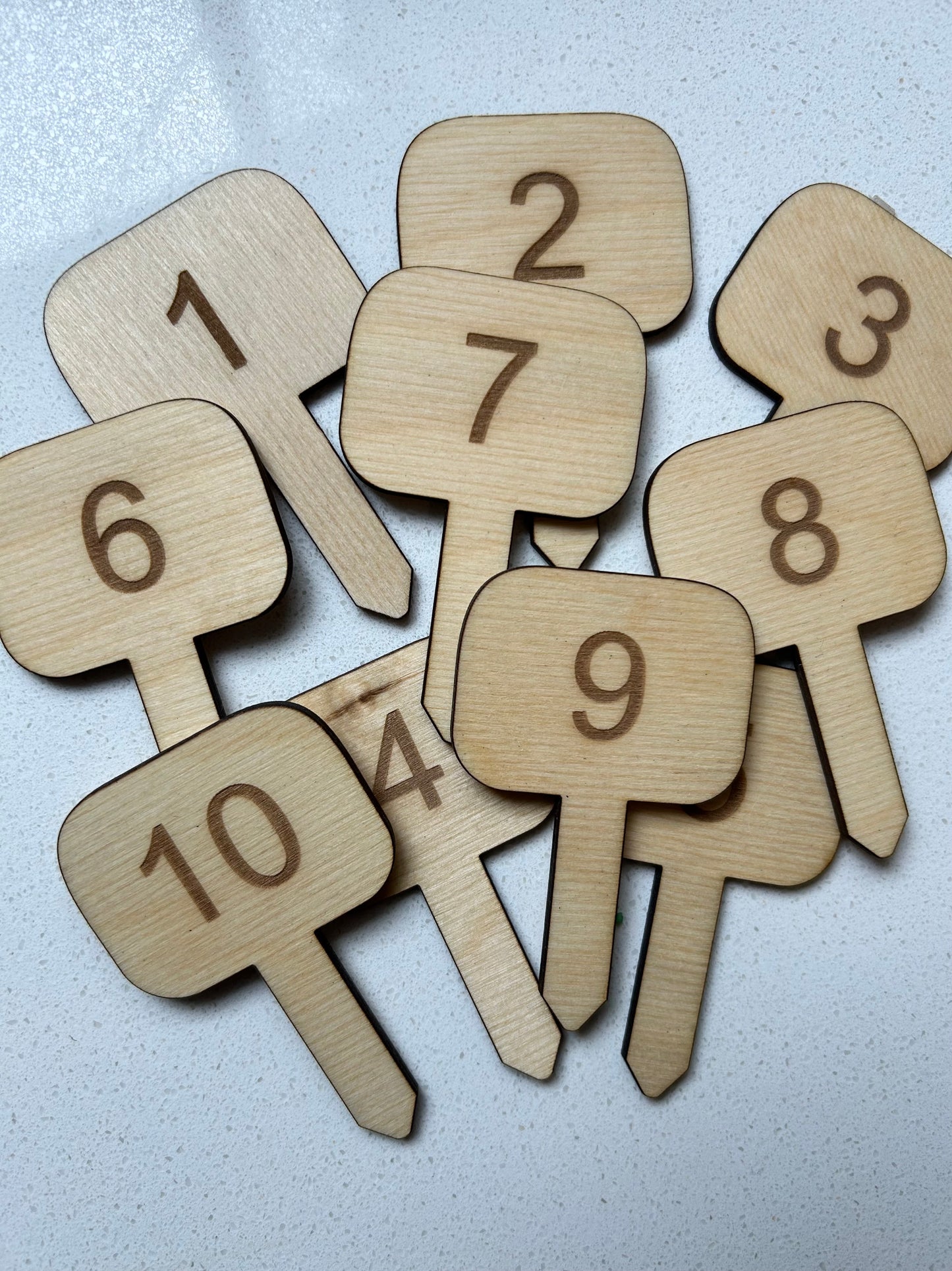 Wooden numbered garden stakes